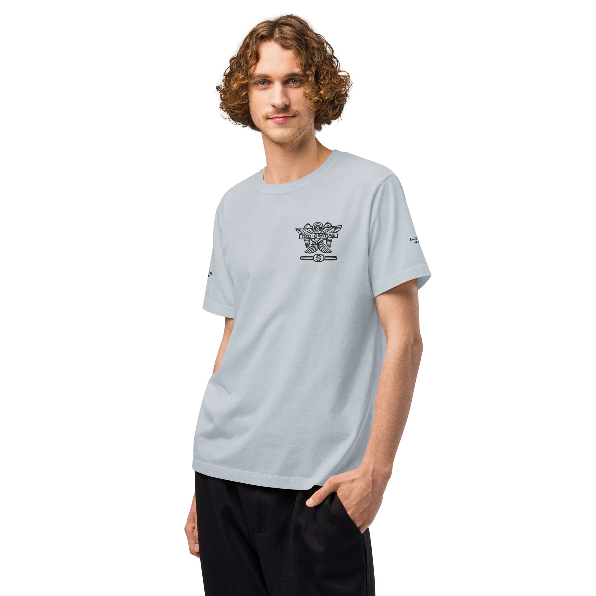 SAVANT NOIR Dieu des Batailles graphic tee in light grey with black emblem worn by male model