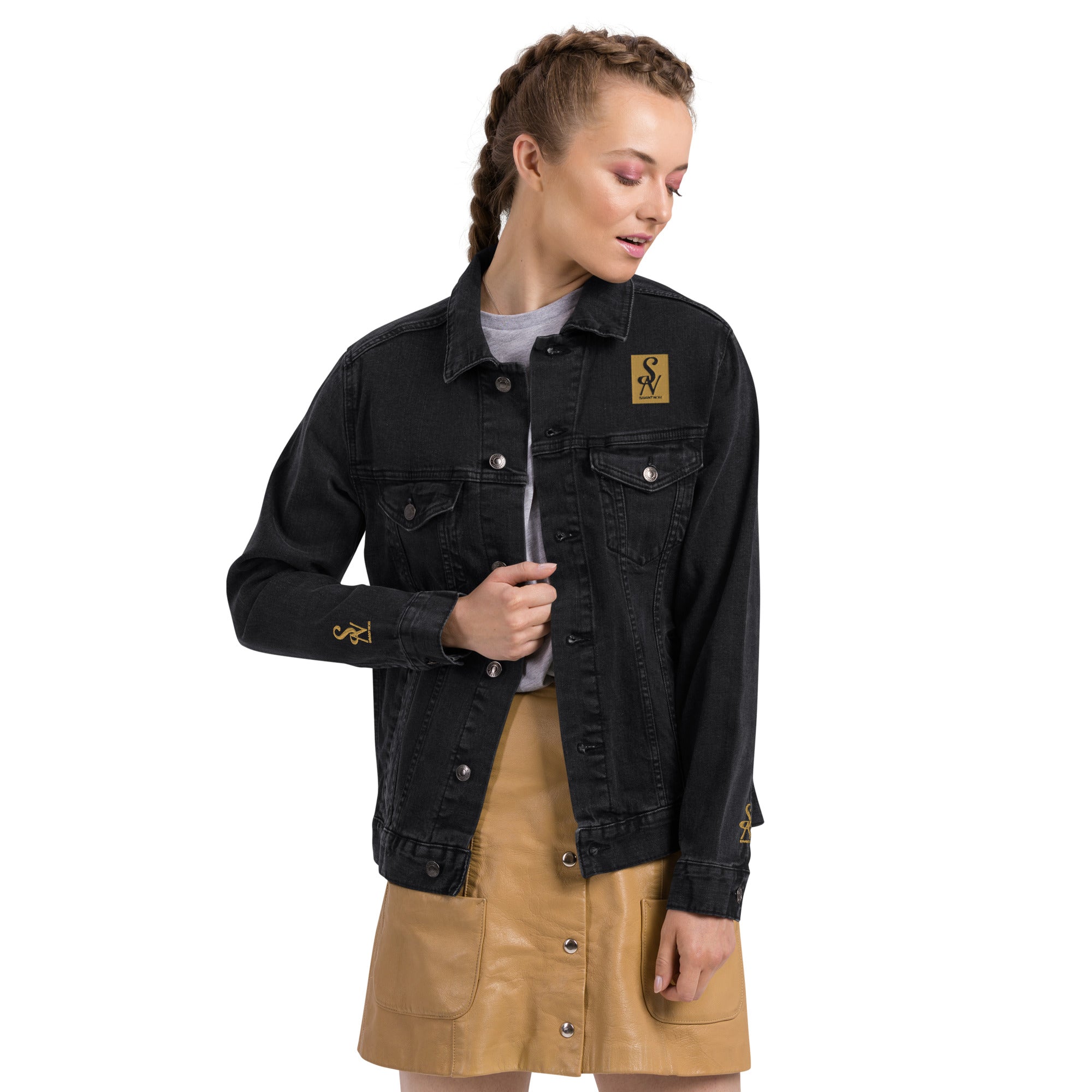 SAVANT NOIR luxury black denim jacket worn by woman styled with tan buttoned skirt