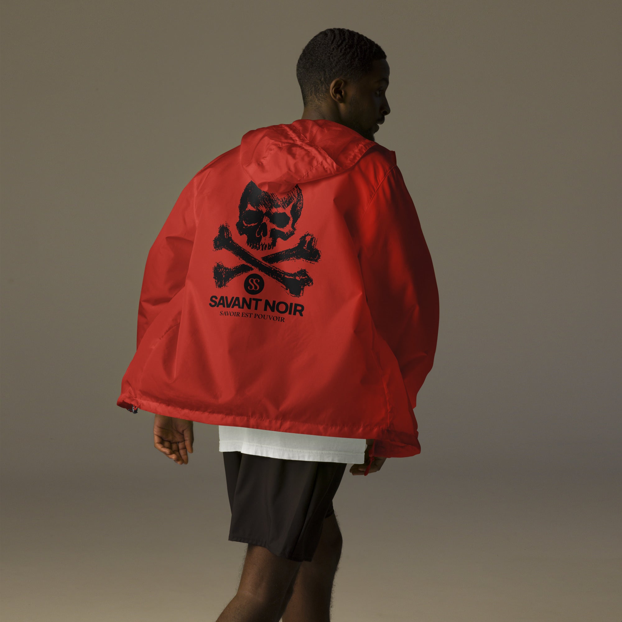 SAVANT NOIR lightweight zip up windbreaker in red with black skull and crossbones design on back