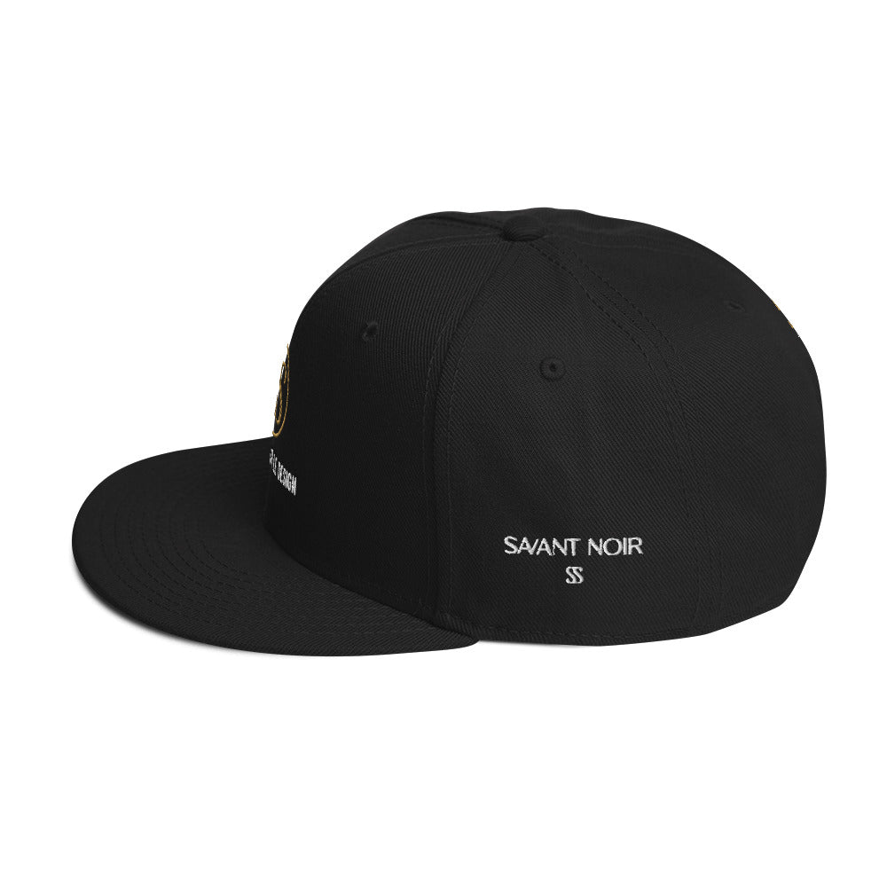 Luxury black snapback hat by SAVANT NOIR with embroidered logo and flat brim design