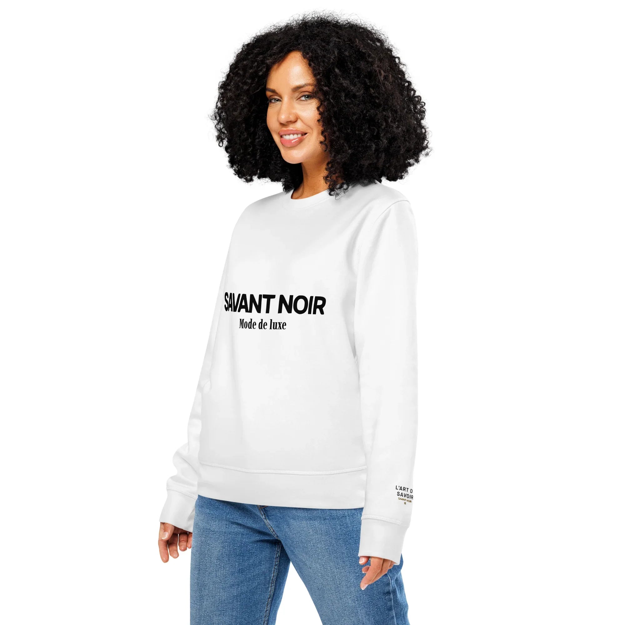 SAVANT NOIR luxury midweight crewneck sweatshirt in white with black logo worn by woman with curly hair