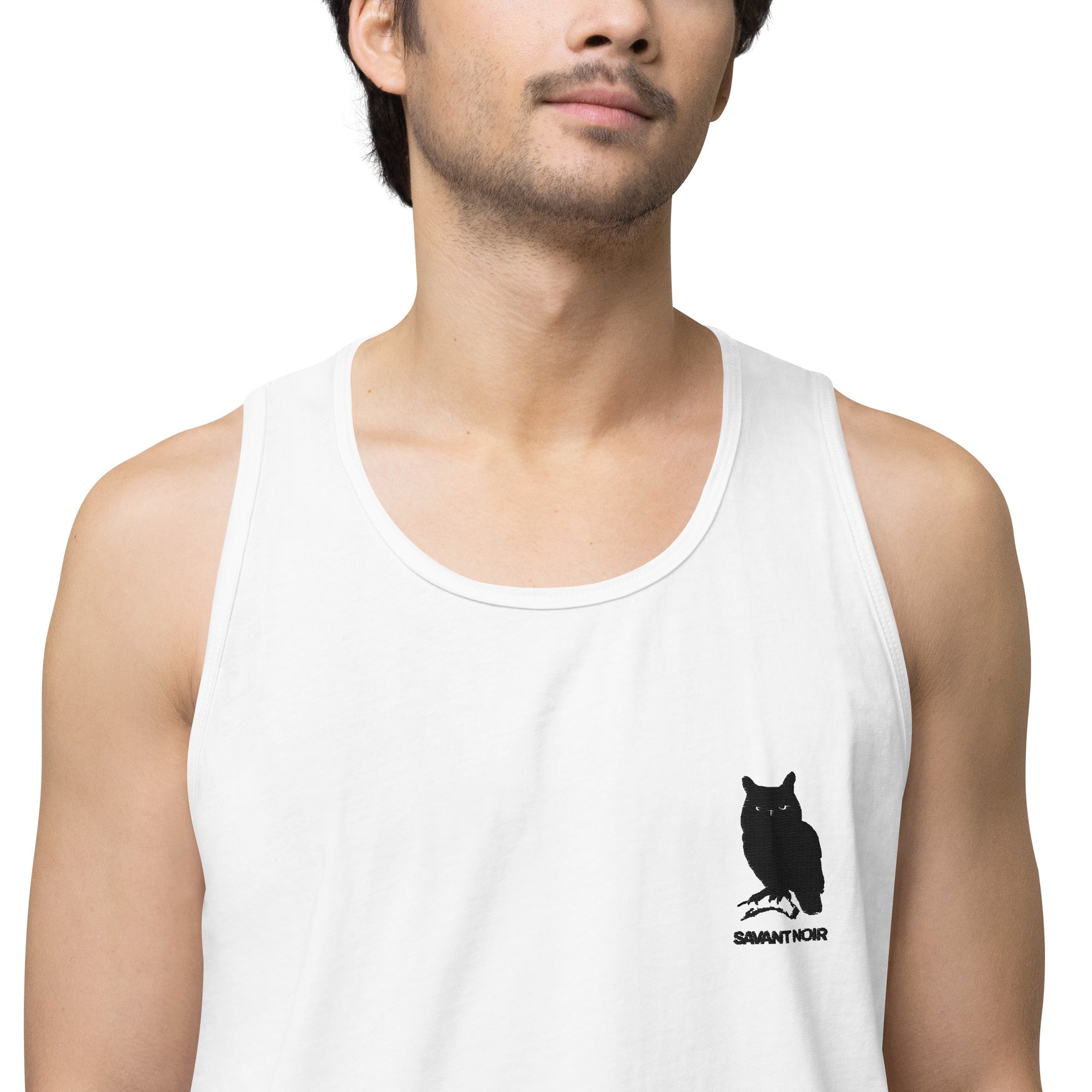 SAVANT NOIR white luxury minimalist tank top with black owl logo on chest worn by male model