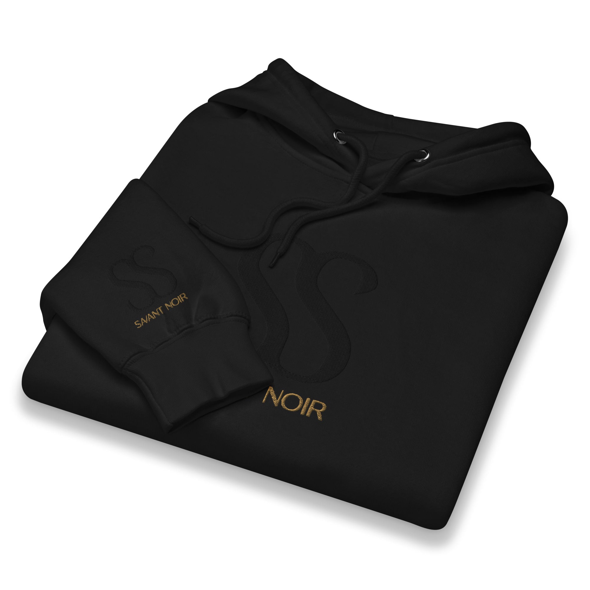 Savant Noir black luxury streetwear hoodie with subtle logo and gold lettering folded neatly