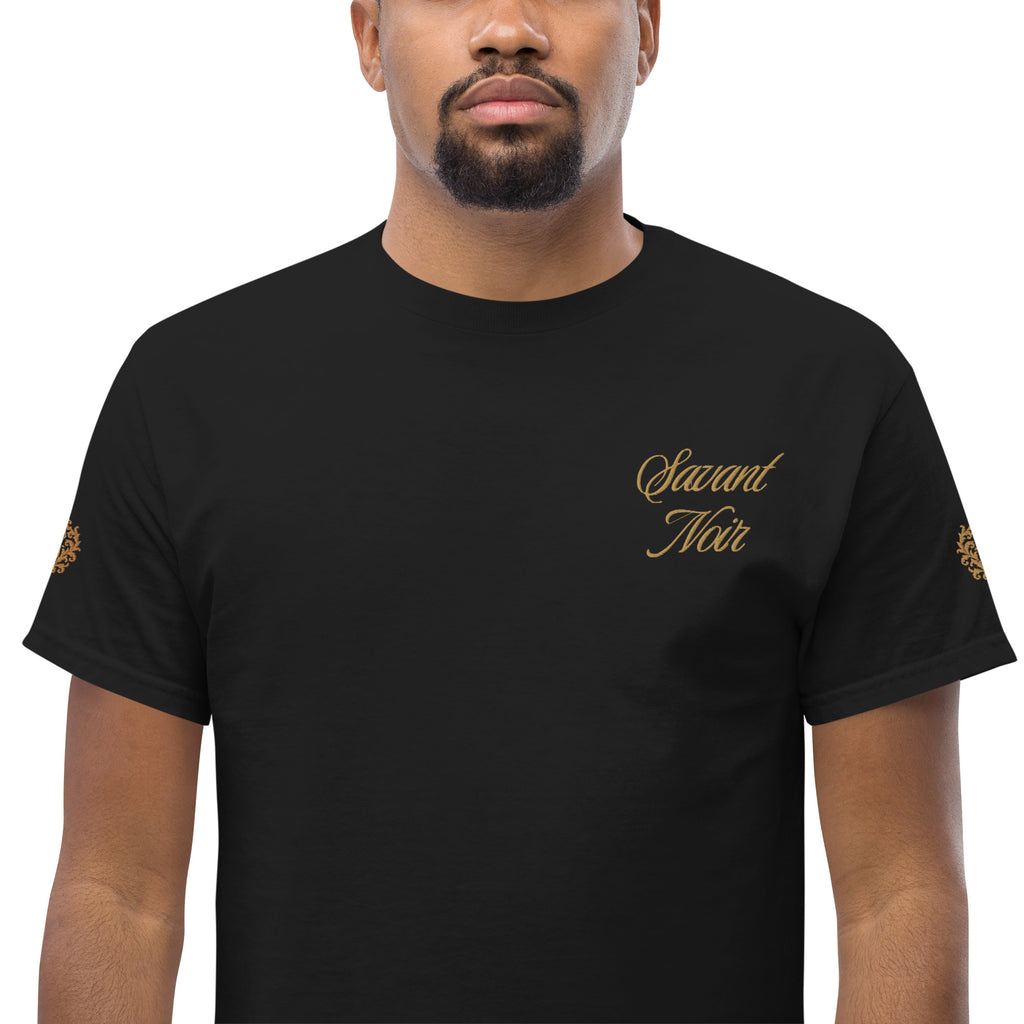 Black NO WARS embroidered tee by SAVANT NOIR with gold script logo on chest and sleeve designs