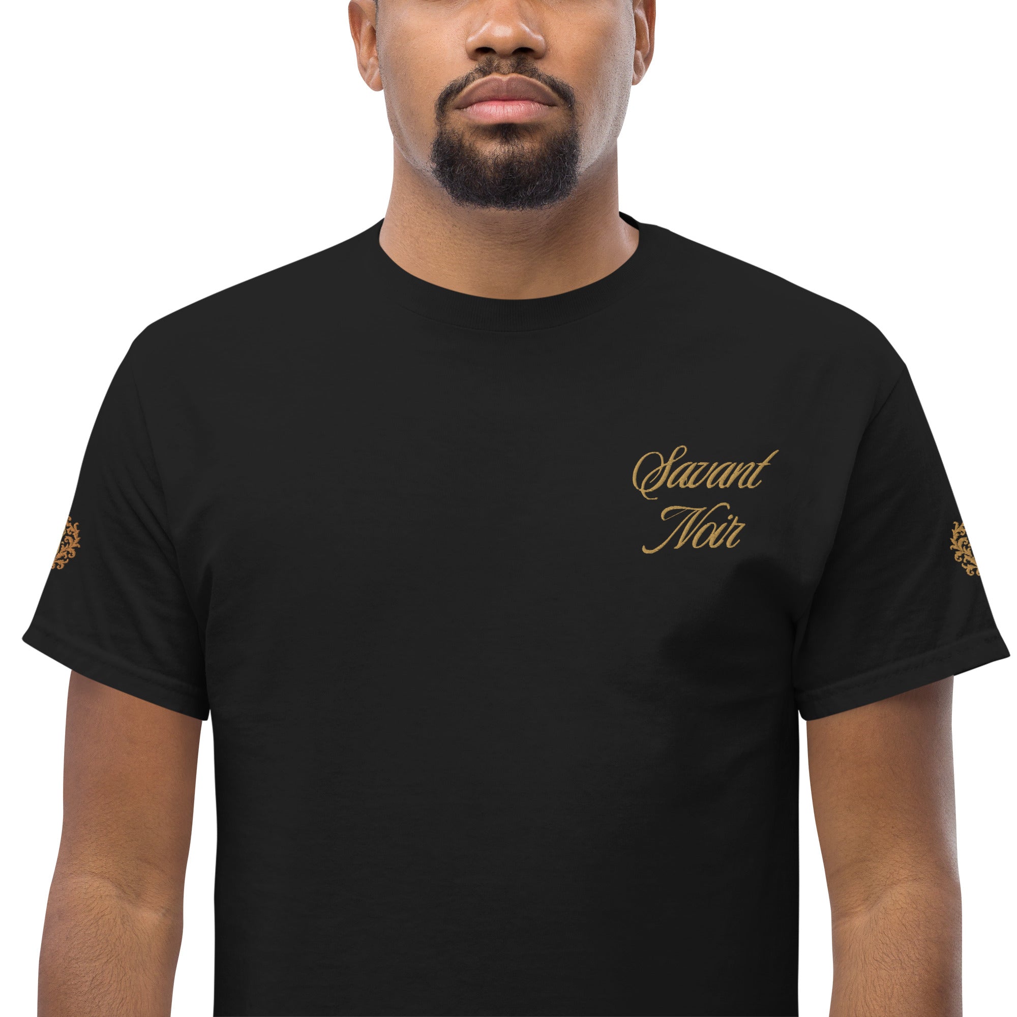 Black NO WARS embroidered tee by SAVANT NOIR with gold script logo on chest and sleeve designs