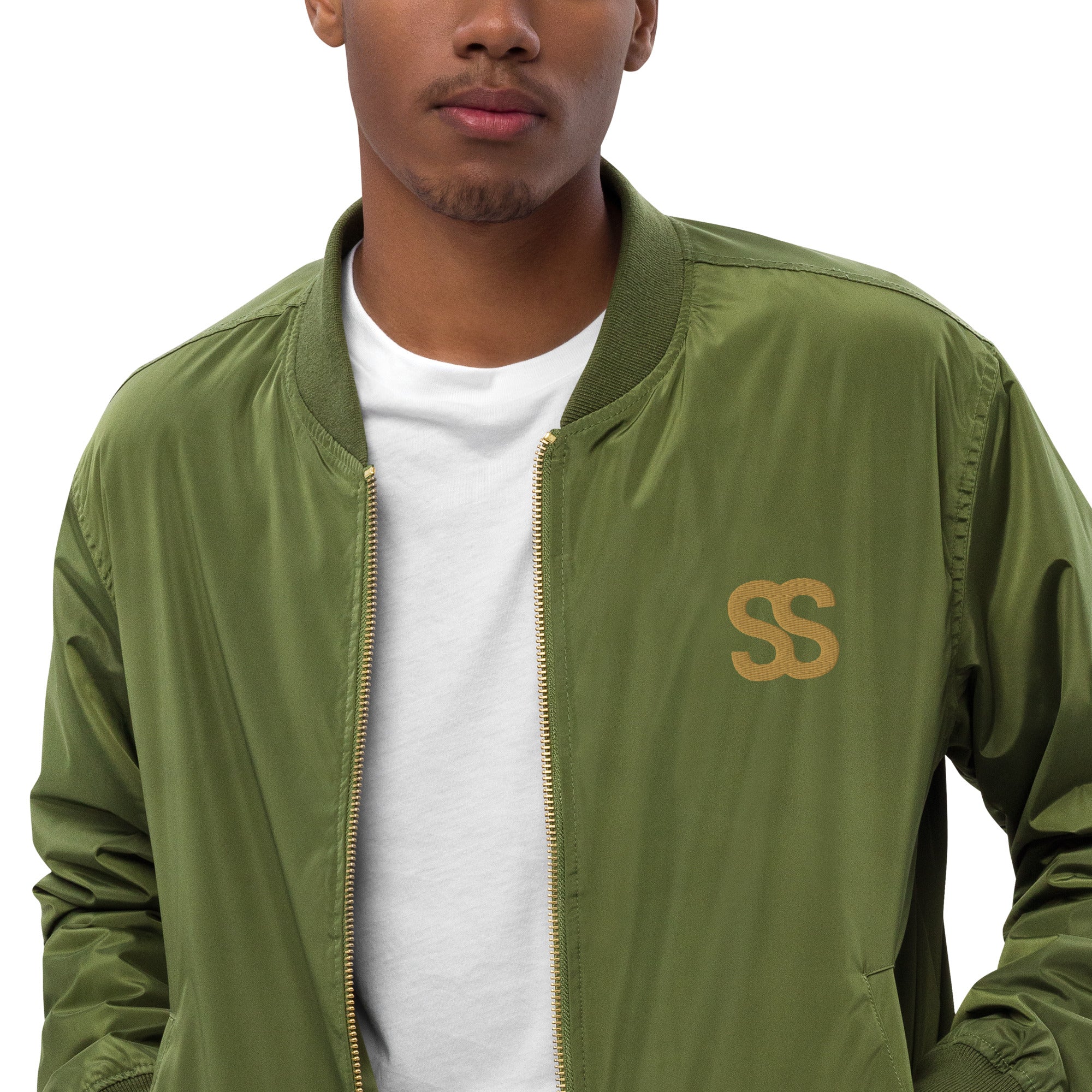 SAVANT NOIR designer olive bomber for men with gold SS logo and zip front over white shirt