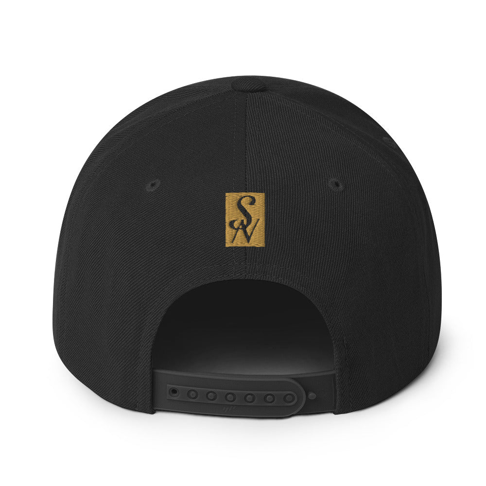 Back view of SAVANT NOIR black luxury snapback hat with adjustable snap closure and gold logo patch