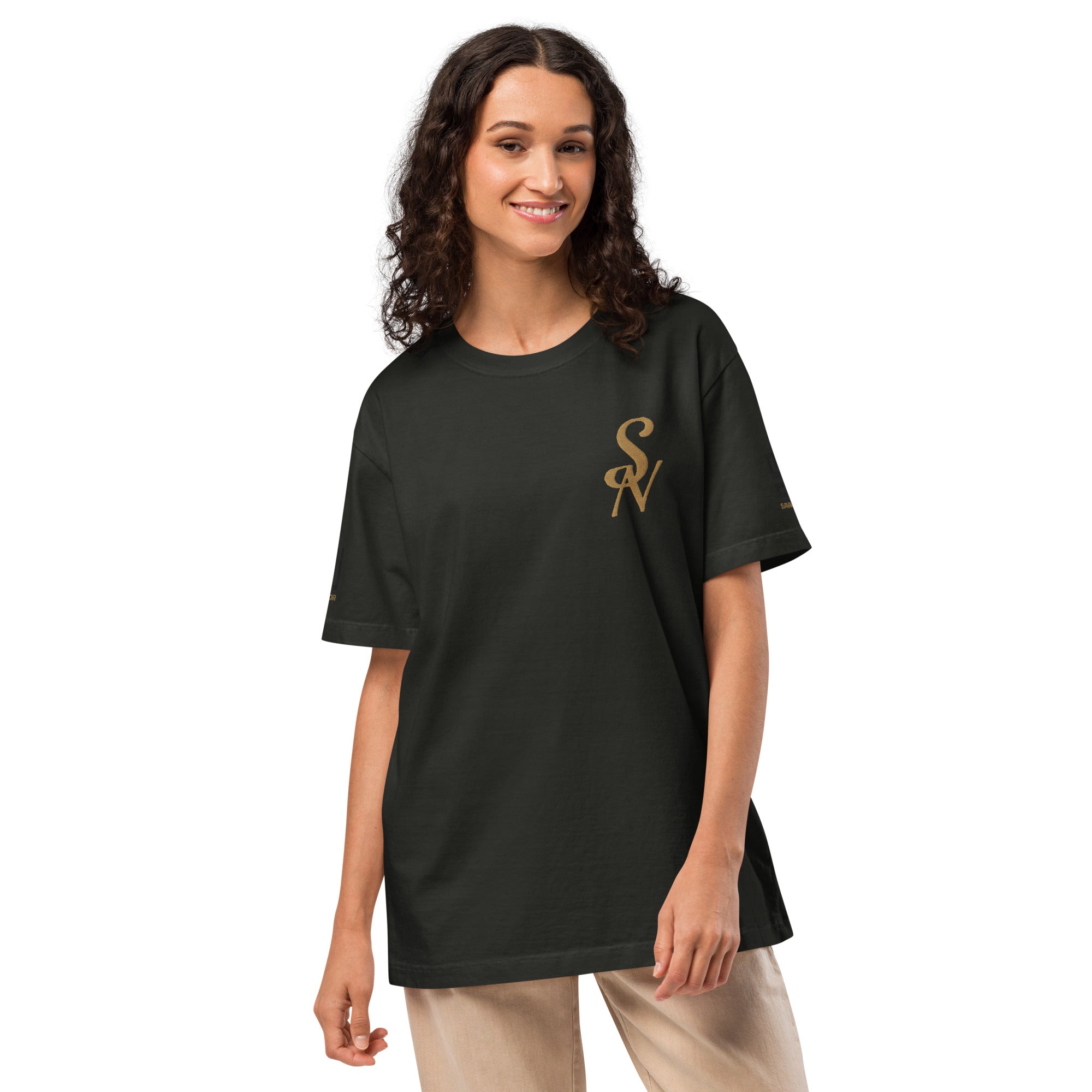 SAVANT NOIR black luxury minimalist t shirt with gold logo worn by smiling woman