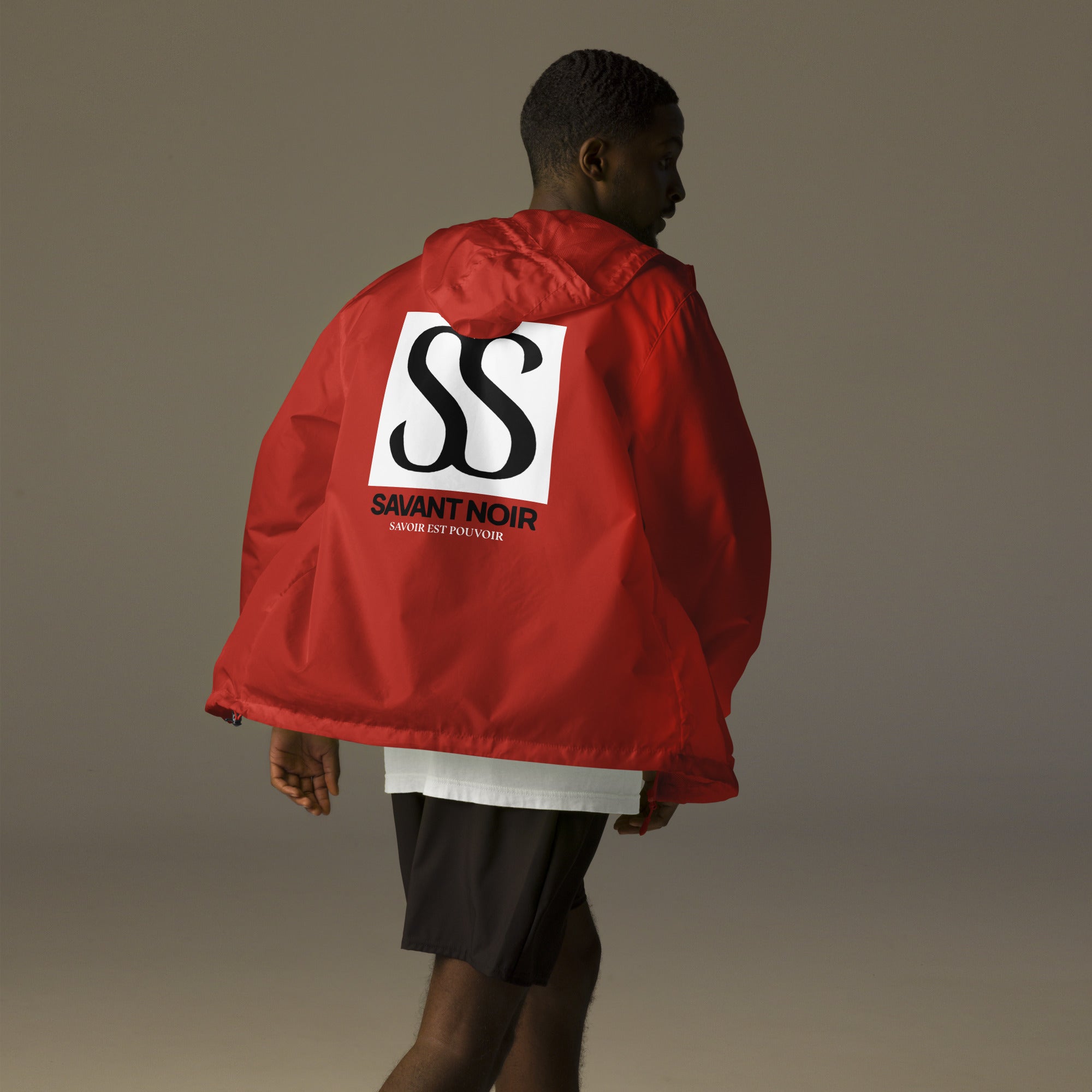 SAVANT NOIR red luxury unisex windbreaker with large logo on back worn by model